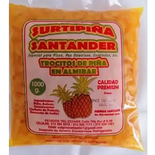 Piña en trozos: paq x 1000 g